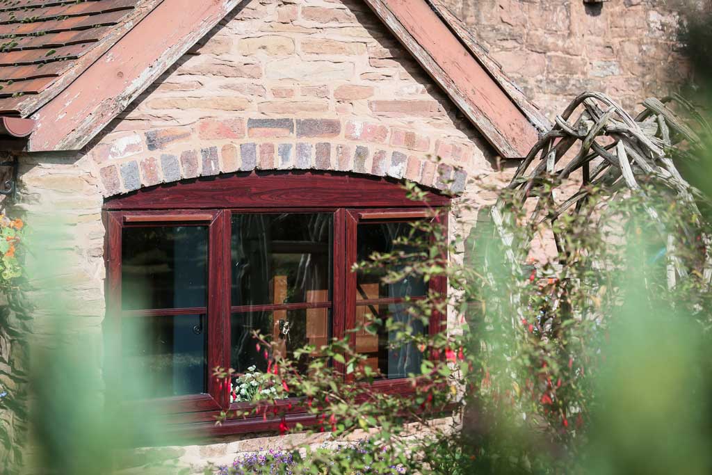 Red Flush Sash Windows on a Red Brick Building in Bristol