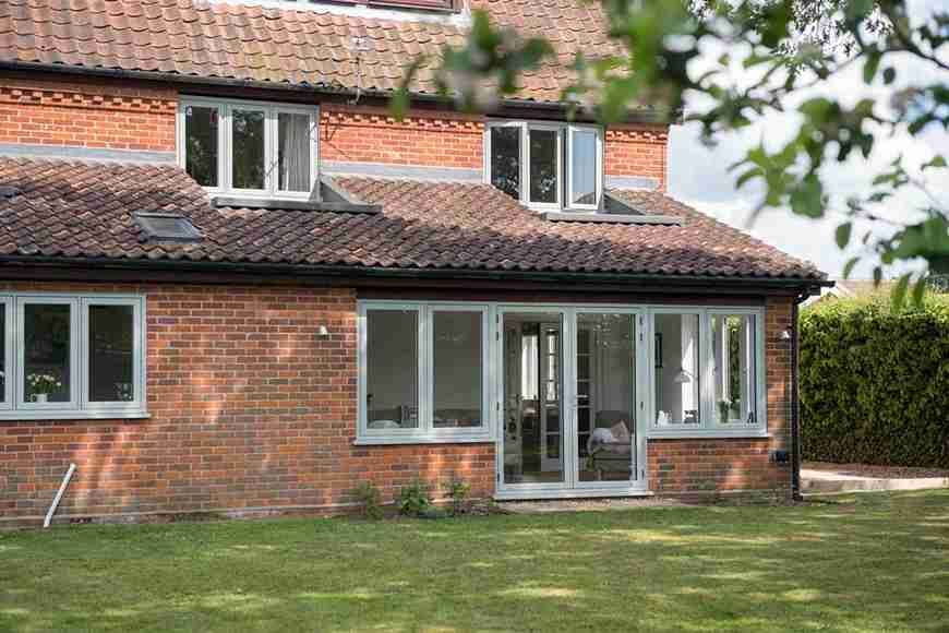 Red brick house with double glazed windows in Swindon