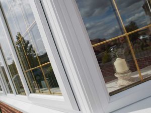 close look of white upvc double glazed window reading